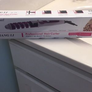 Spiral curling iron